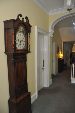 Grandfather clock in hall way