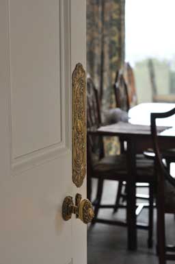 original door handles  of the dining room door. 