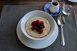 porridge laid out with fruit for breakfast